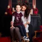 Shooting photo bébé Noël avec décor lumineux et magique